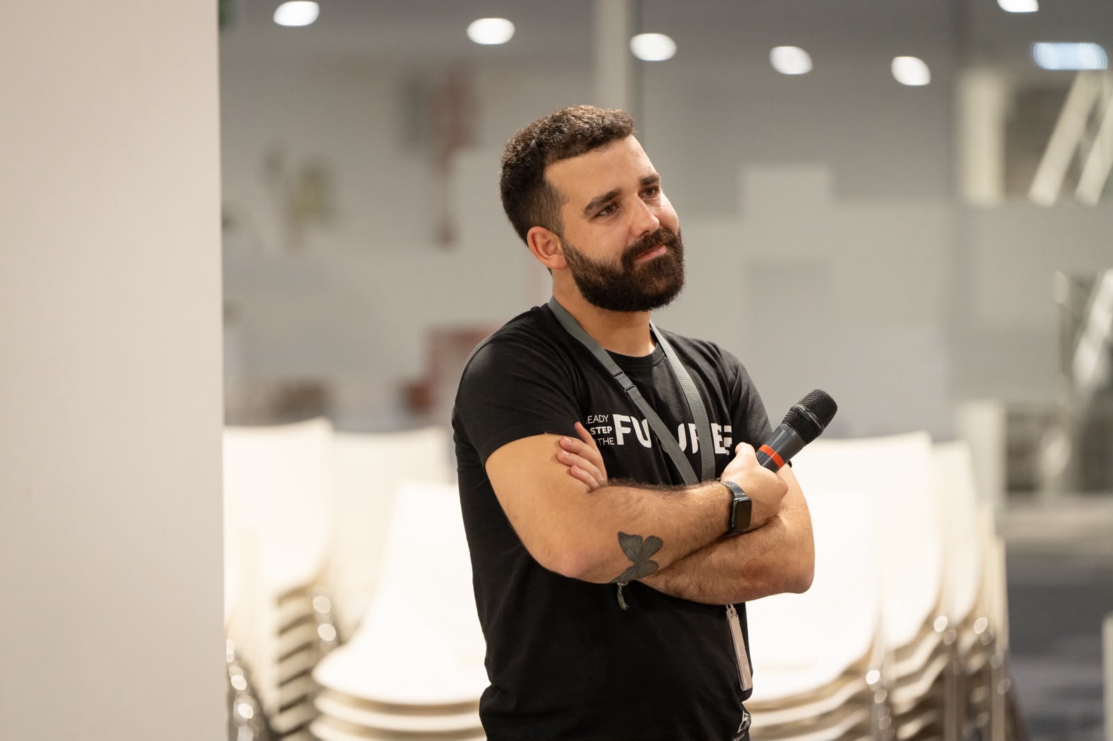 Luís Miguel Cerqueira holding a microphone