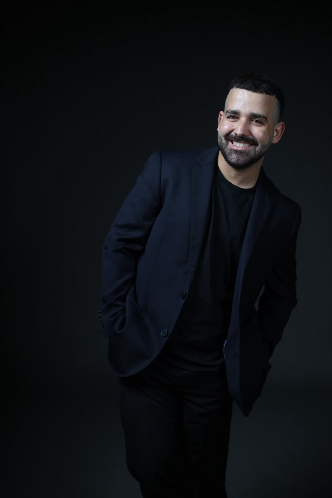 Portrait of Luís Miguel Cerqueira in a dark blazer and black t-shirt